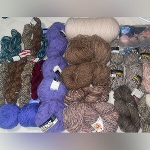 Assorted Yarn Collection in Purple, Brown, and Cream